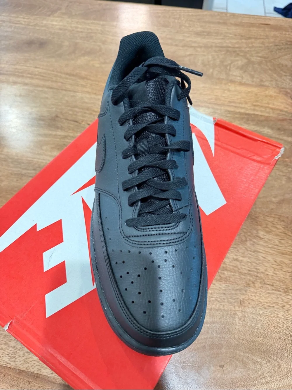 Nike Men’s All-Black Low-Top Leather Sneaker